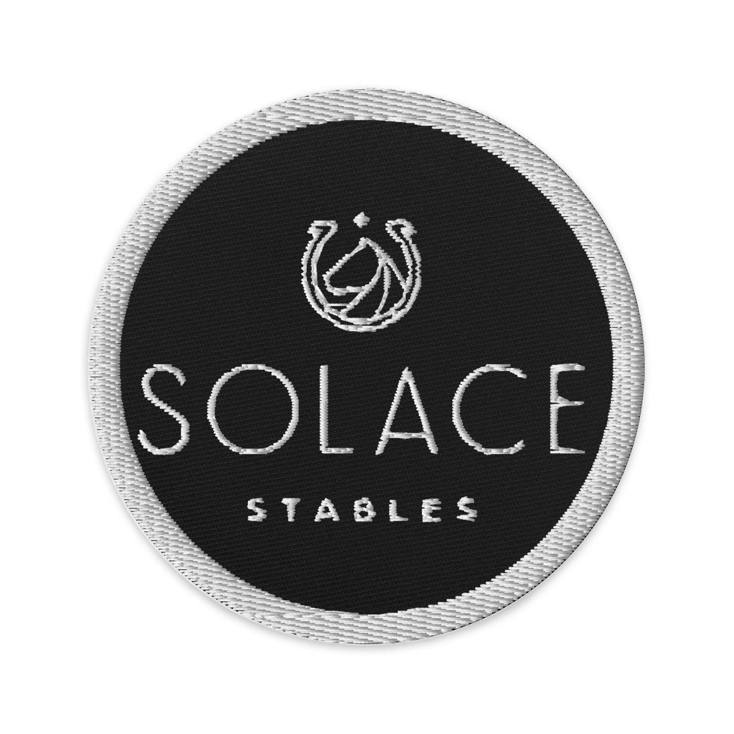 Circular Patch "SOLACE STABLES" Embroidered in Classic White on Basic Black